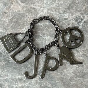 Donald J Pliner bag charm fob hangtag letters